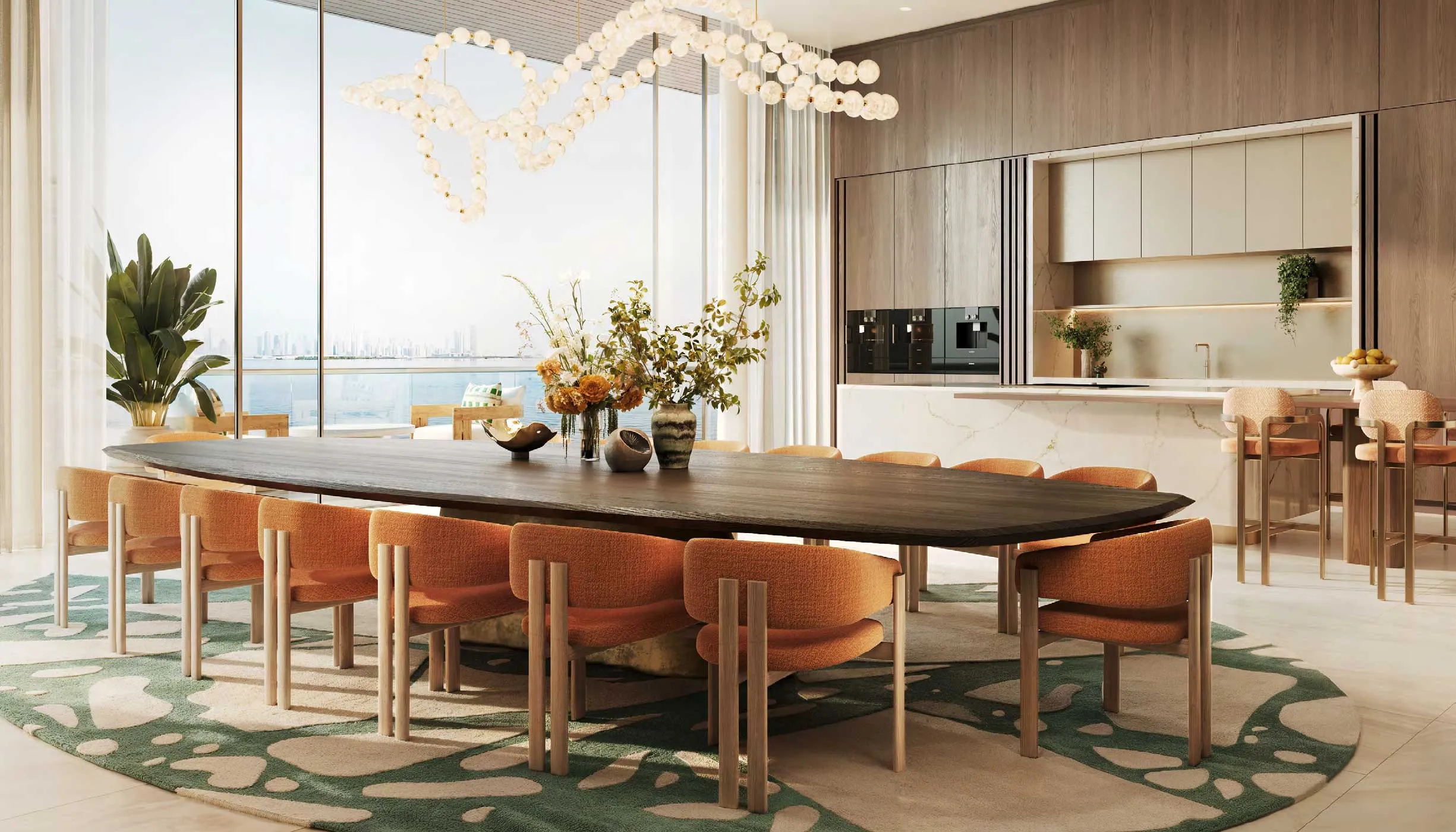 Dining room and kitchen in a Solaya residence